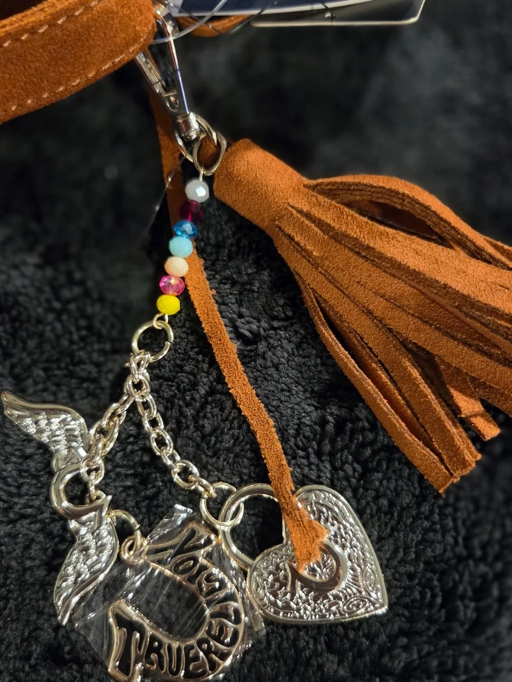 True Religion Faux suede fringe purse with silver studs and a heart charm